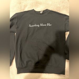 Something about her gildan sweatshirt.